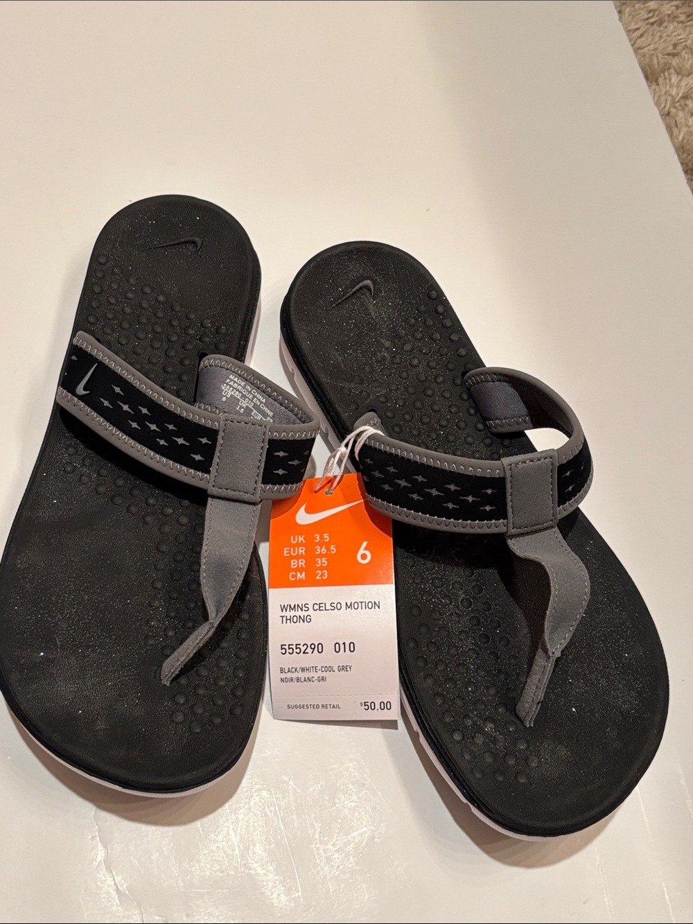NWT Nike sandals, thongs flip-flops celso motion 6 black